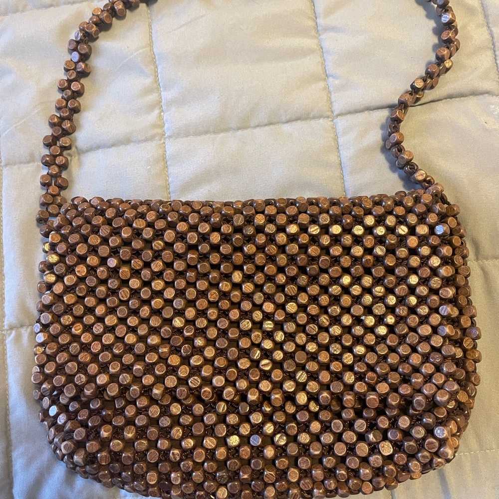 The Sak wood beaded purse size medium